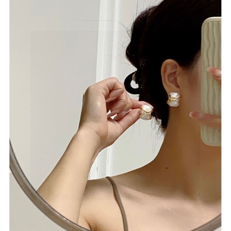 Ch*el earrings